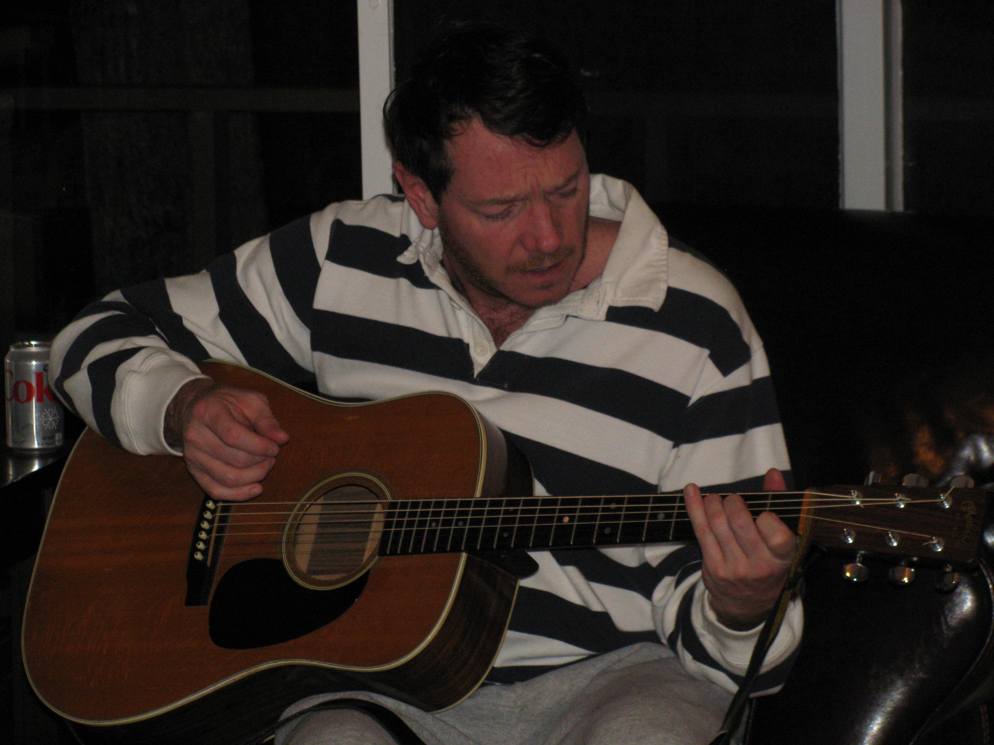 Dad playing guitar